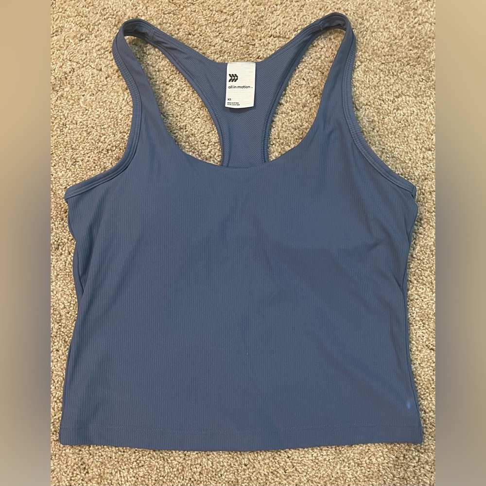 Exercise top with removable pads